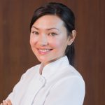 62ff8b531565458a8d5ef90e088a49e7 Portrait of a confident female masseur